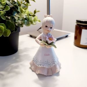 🌺 3/25 Christopher Collection figurine, October, girl with flowers